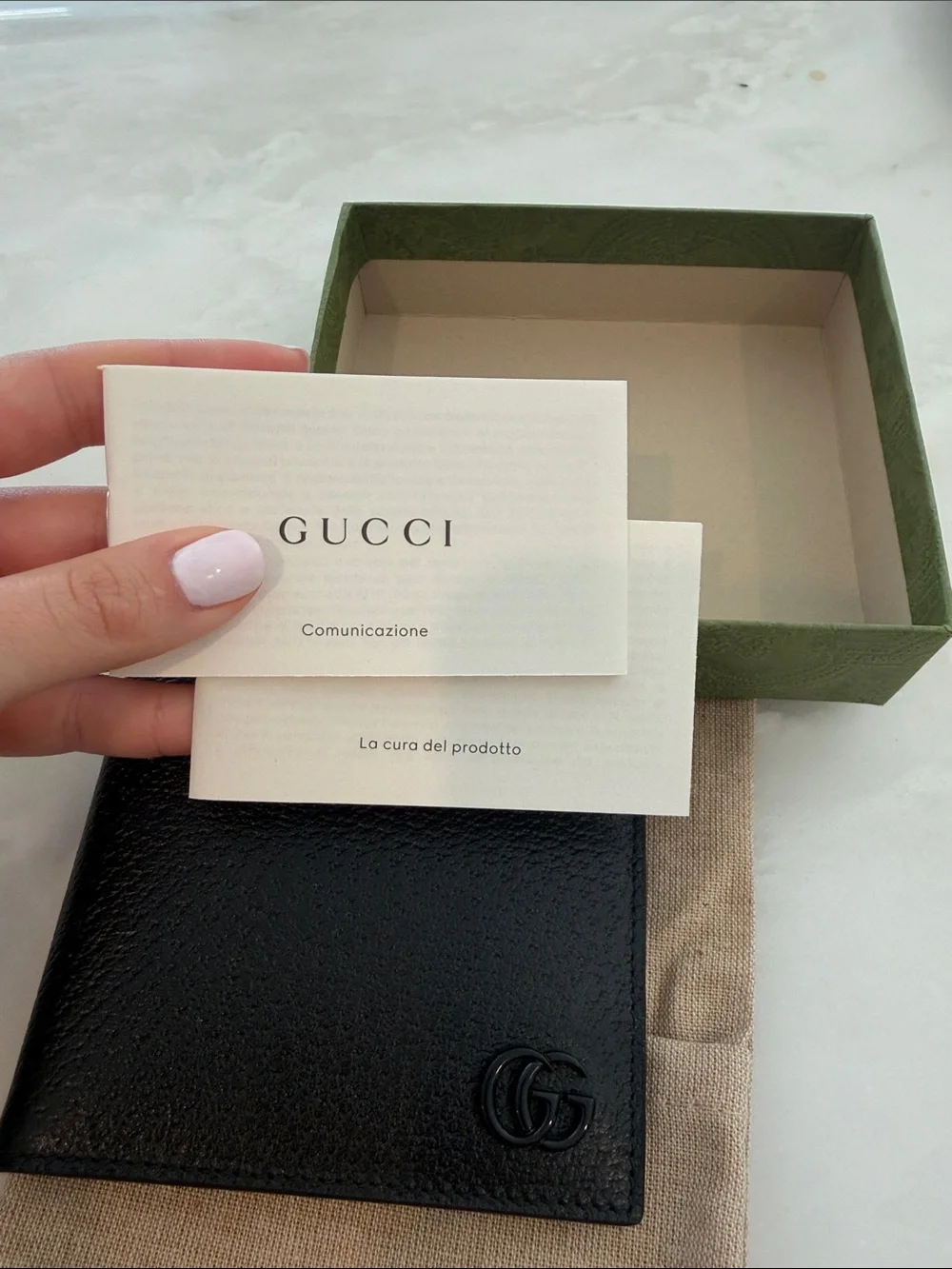Gucci Black Leather Bi-Fold Wallet with Subtle GG Emblem